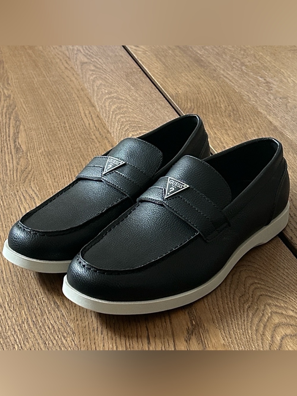 NWOT. GUESS Black Leather Slip-On Loafers with White Sole Size 11.5